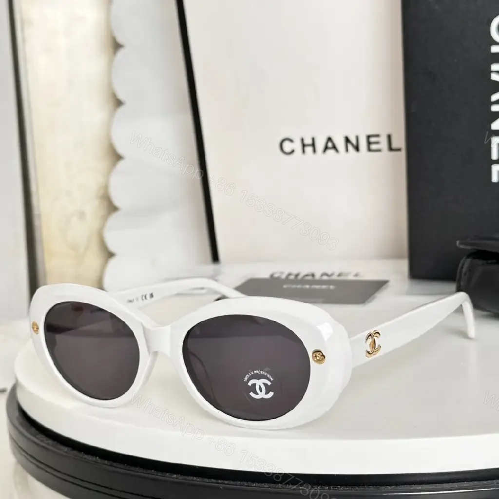 View 4 of Lux Black Round Sunglasses with Gold Hardware, Oversized UV Protection