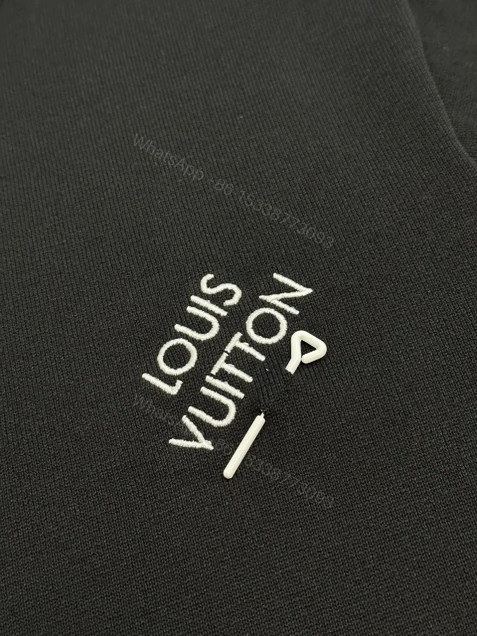 View 6 of Minimalist Black Crewneck Tee Dress – Subtle Logo, Versatile Dress