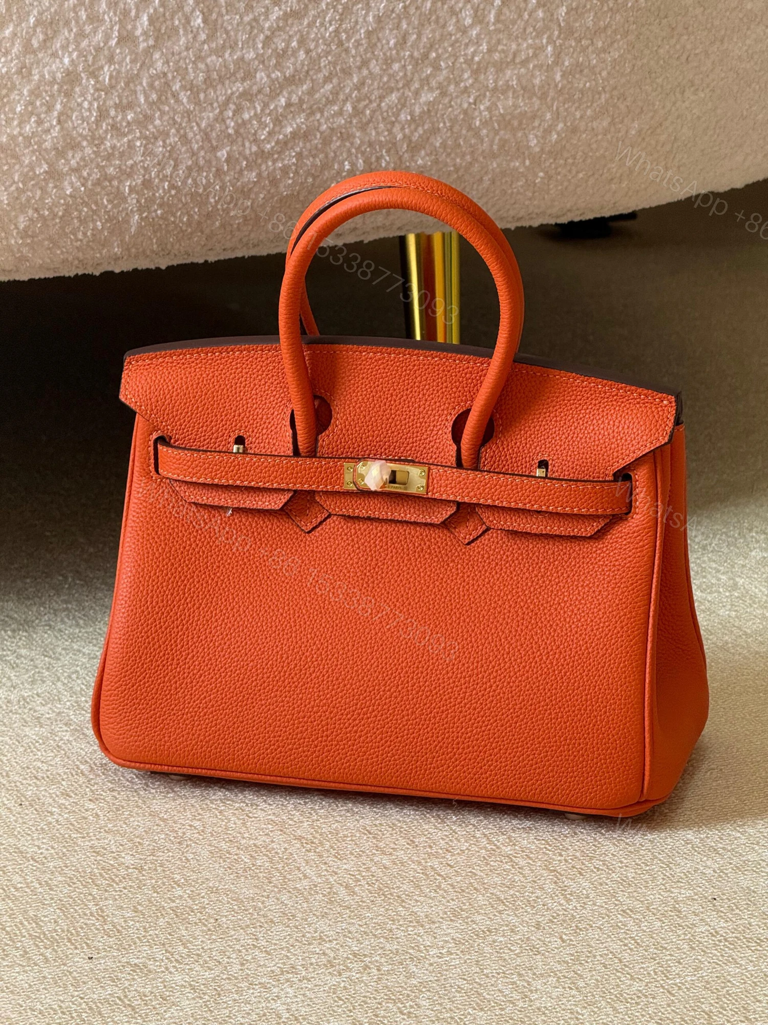 Hermès Birkin 25 bag in Orange Feu or Orange H Togo Leather — view 1