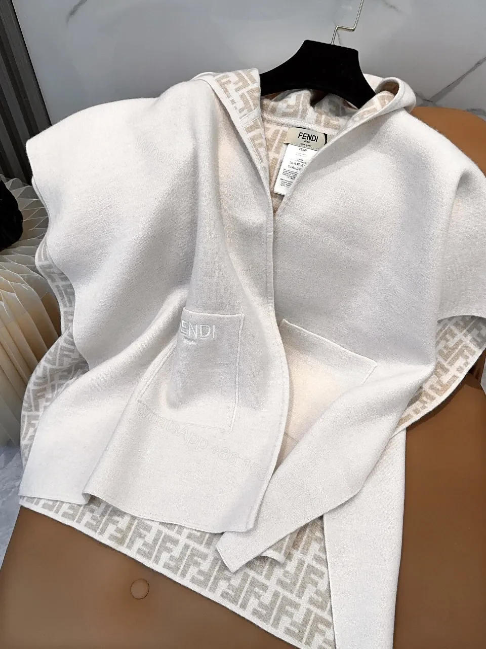 View 8 of Soft-Neutral Knit Cape Jacket: Luxury Comfort & Signature Trim