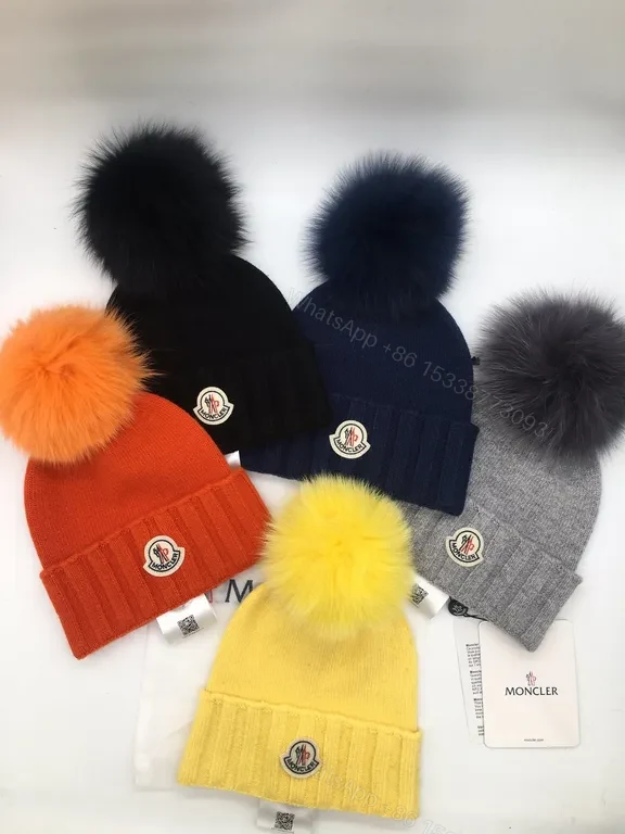 View 8 of Sunny Yellow Moncler Pom Beanie â€“ Luxurious Warmth, Bold Color Pop