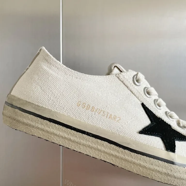 View 7 of Chic Canvas Star Sneakers - Signature Detail, Unisex