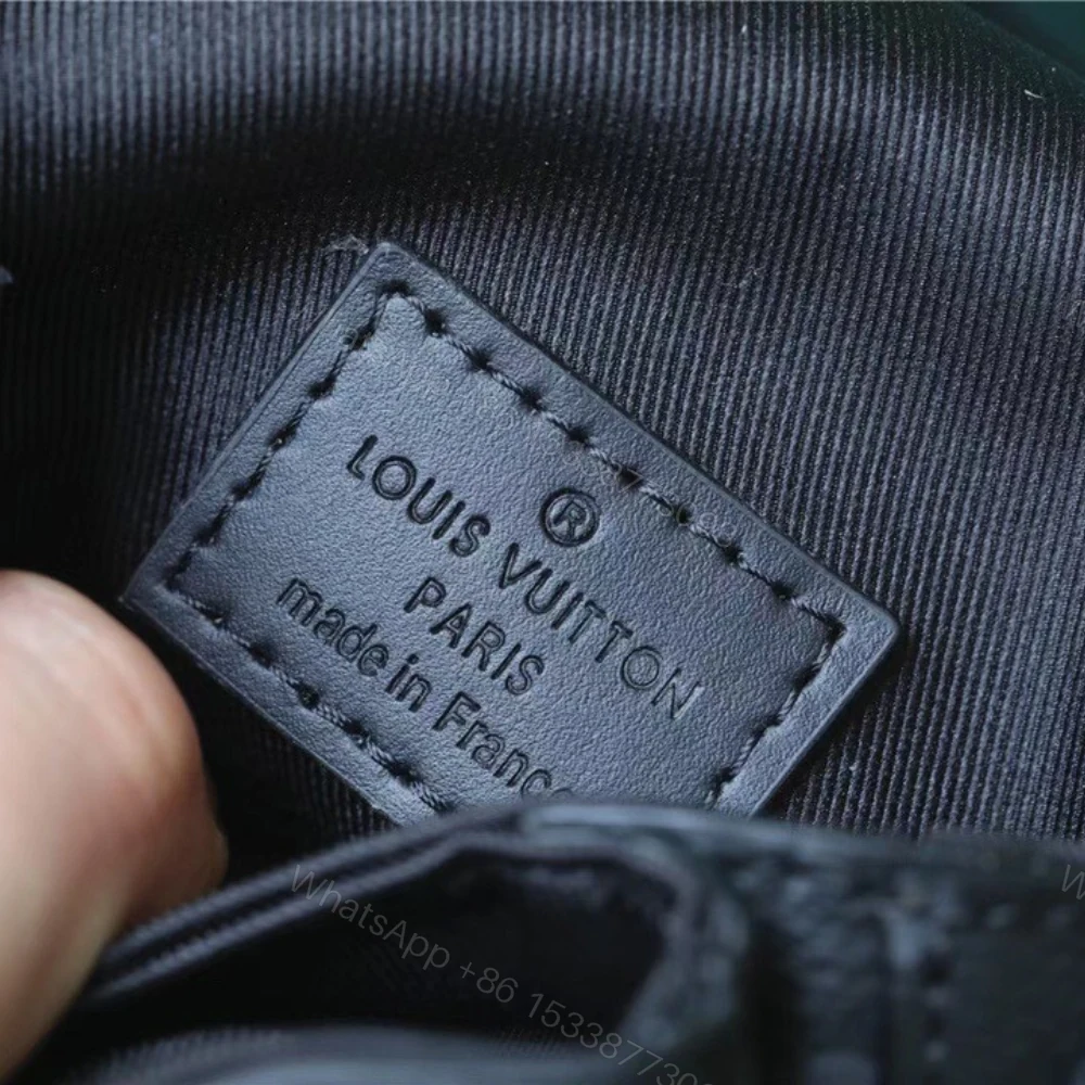 View 8 of Louis Vuitton S-Lock Vertical Wearable Wallet Monogram Eclipse 19cm