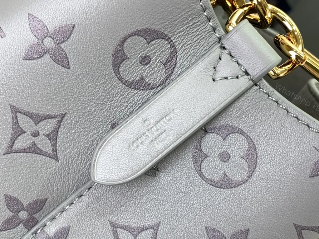 View 4 of Chic Monogram Bucket Bag: Gray Leather, Chain Accent, Versatile Luxury