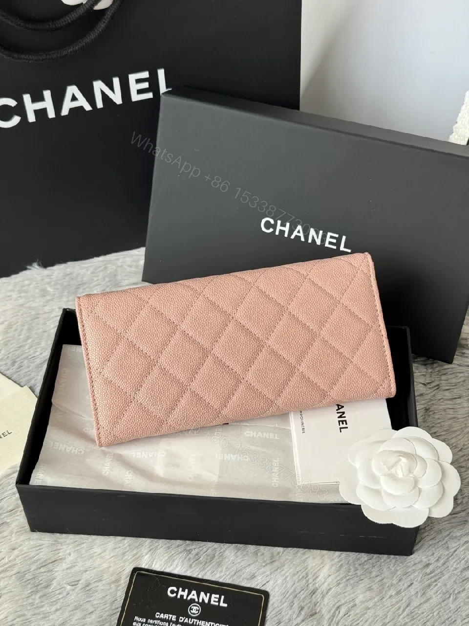 View 3 of Soft Pink Quilted Wallet with Silver Emblem - Compact Luxury Wallet
