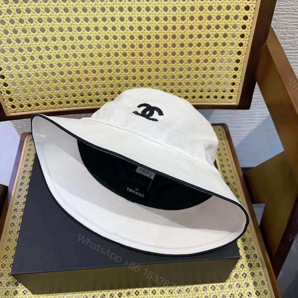 View 8 of White Cotton Bucket Hat - Luxe Minimalist, Subtle Logo