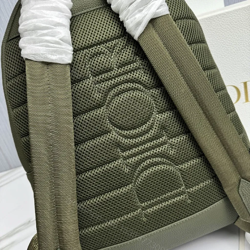 View 3 of Olive Leather-Textured Compact Backpack with Dior-Inspired Pattern