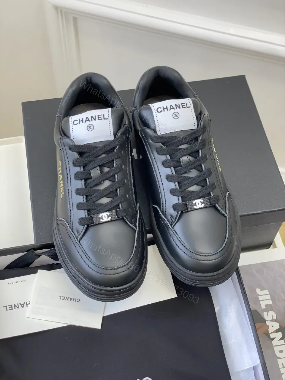 View 6 of Black Leather Sneakers, Subtle Gold Accents, High-Top Style, Everyday Luxury