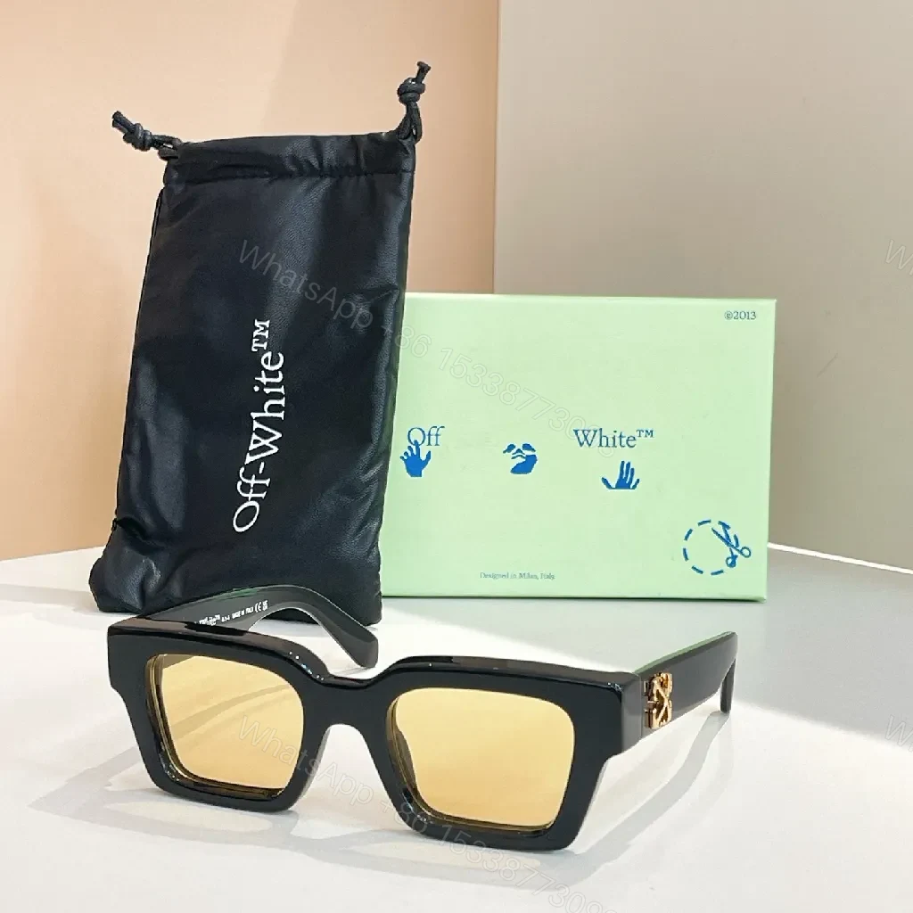 Bold, Modern Frames Sunglasses: Oversized Gold Accents — view 1