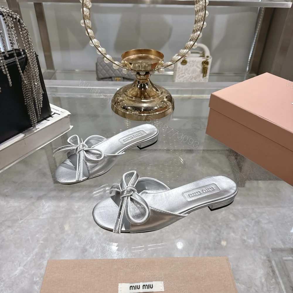 View 3 of MIUMIU MORDORÉ NAPPA SANDALS WITH BOW SILVER