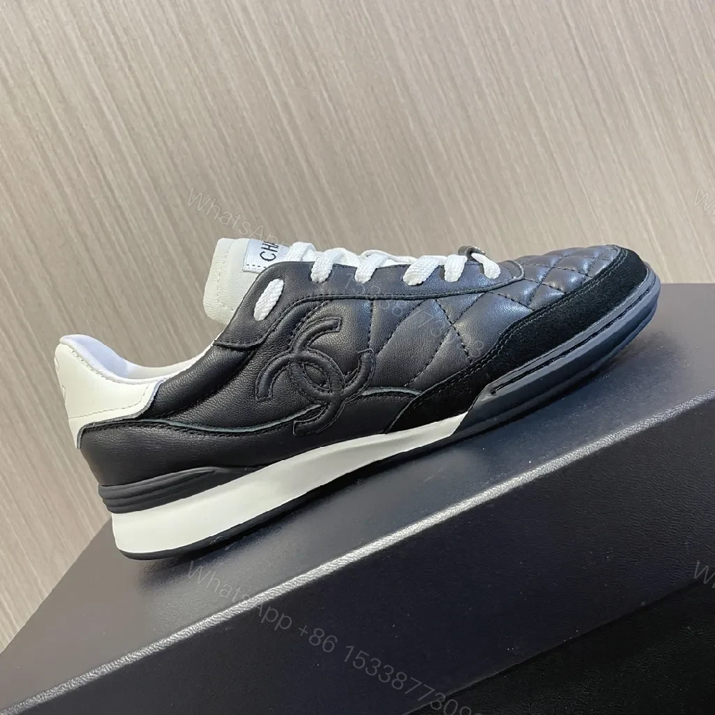 View 3 of Quilted Leather Sneaker - Dual-Texture Black & White, Luxe Comfort