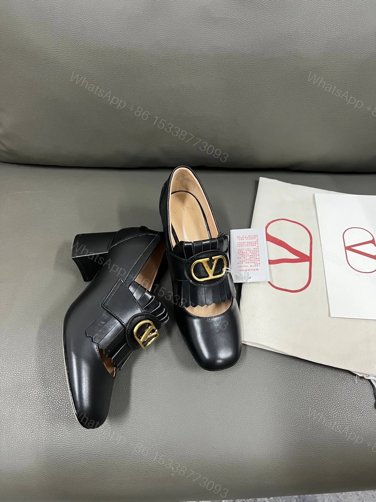 View 2 of Valentino Women Black Leather Fringe Loafers