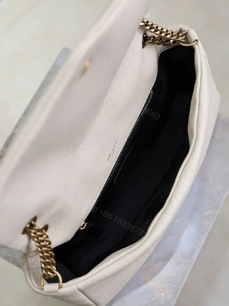 View 5 of Ivory Pebbled Leather Chic Handbag with Gold Hardware