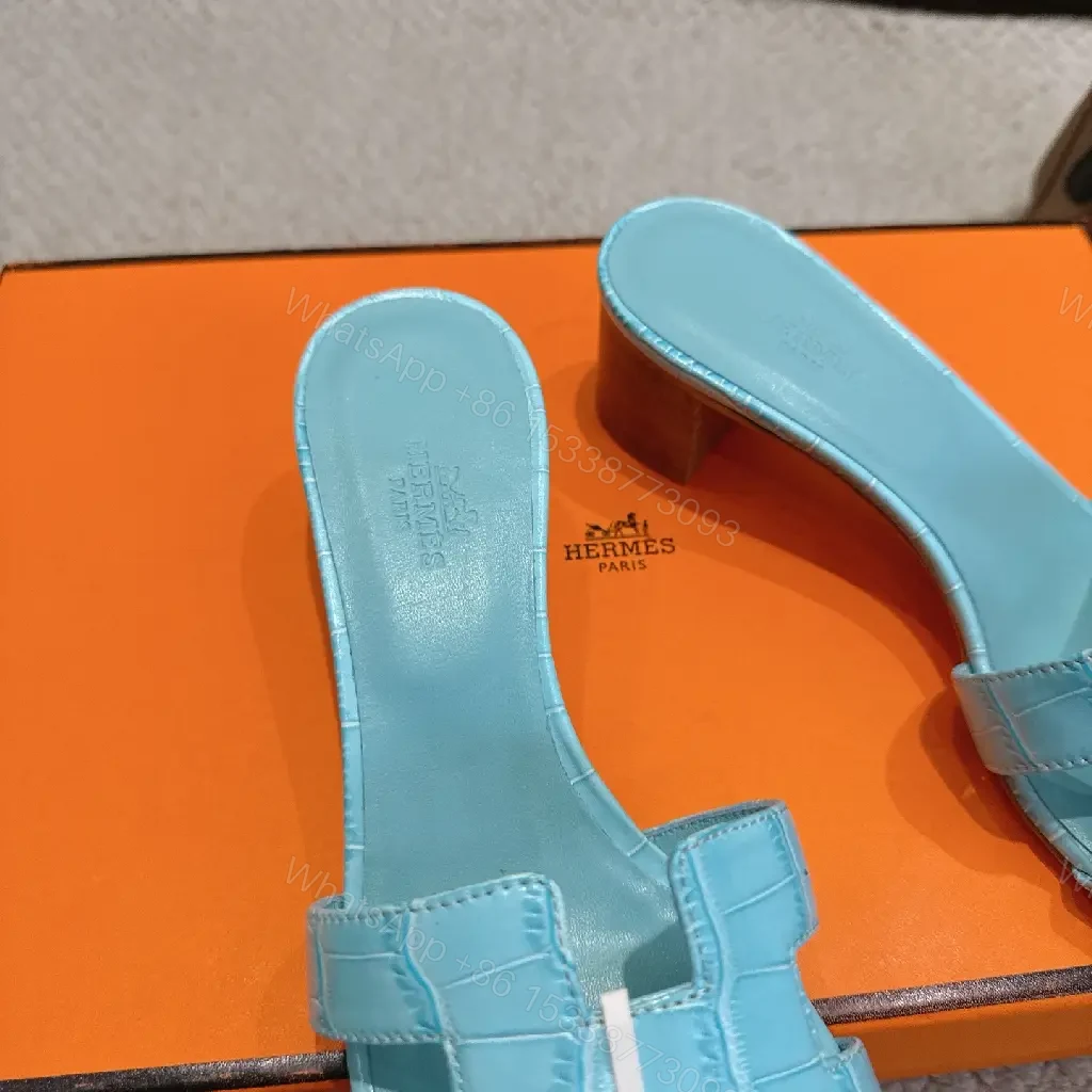 View 2 of Bright Sky Blue Leather Mules with Croc-Texture Strap - Luxury Comfort