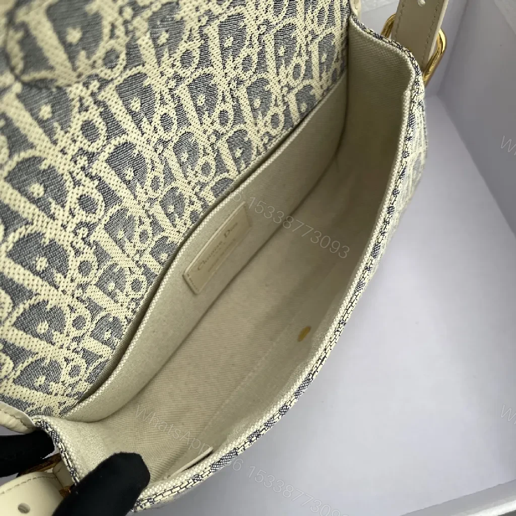 View 9 of Cream Leather-Trim Monogram Crossbody with Gold Turn-Lock, Compact Style
