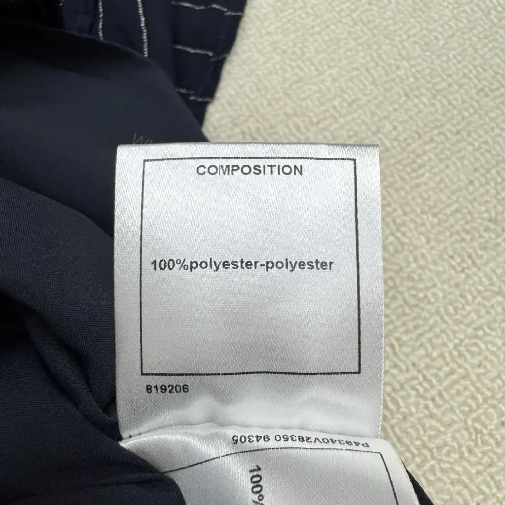 View 8 of Navy Pinstripe Cotton A-Line Dress with Chanel Logo Key Feature