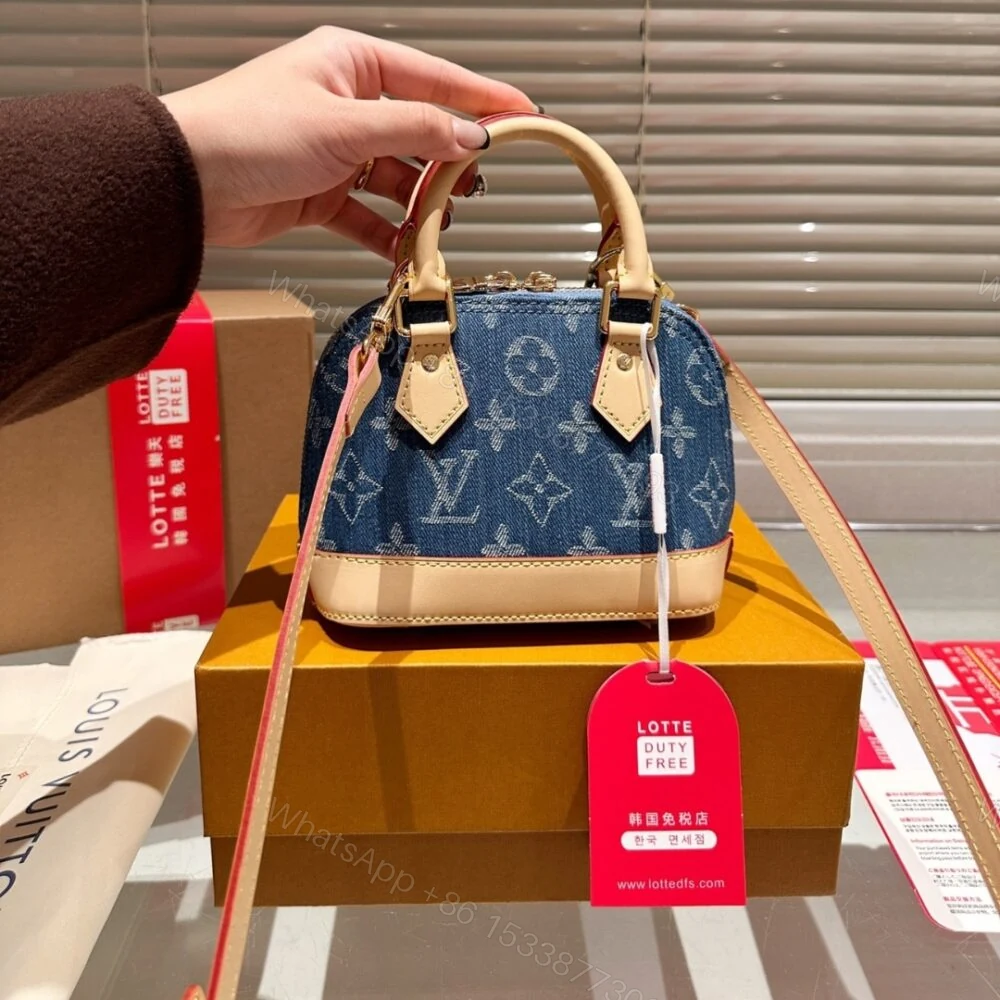 View 2 of Louis Vuitton Alma BB Monogram Canvas Bag Denim Blue 16Cm