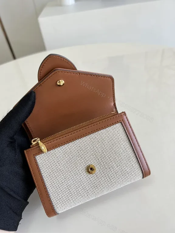 View 7 of Iconic Victorine Wallet: Compact Luxury Canvas & Leather Trim