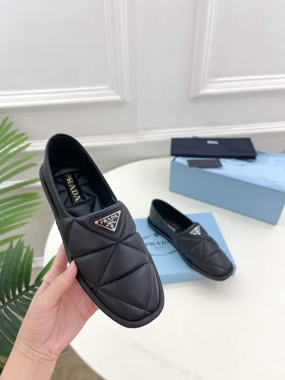 View 2 of Quilted Leather Slip-Ons with Prada Triangle - All-Day Comfort