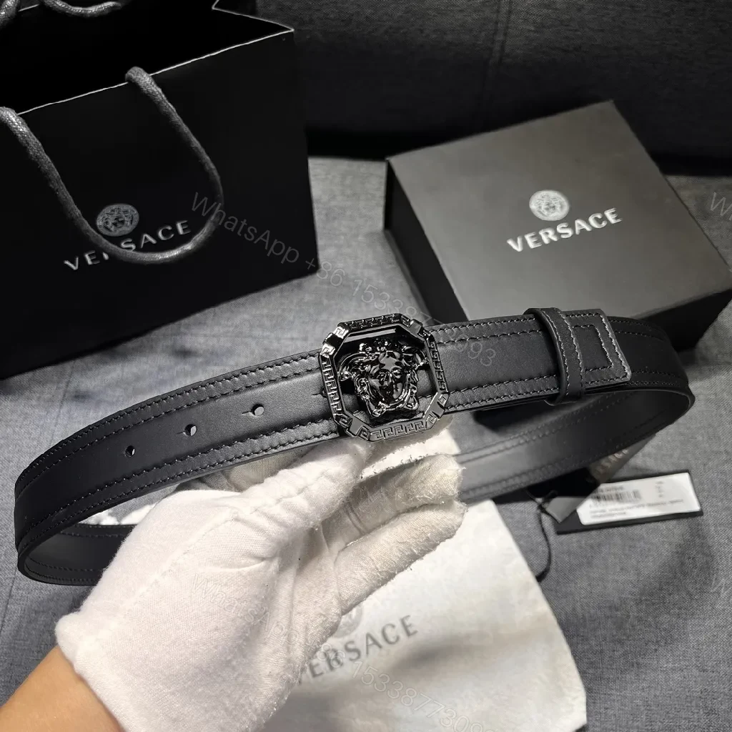 View 2 of Bold Black Leather Belt with Medusa Buckle - Modern Geometric Design
