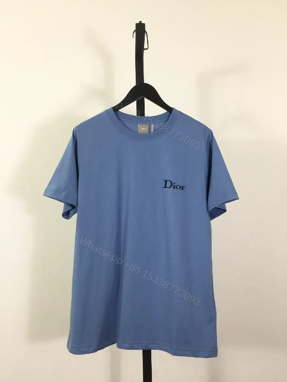 View 9 of Cozy Blue Luxe Tee: Lightweight Cotton-Blend, Subtle Logo, Modern-Casual