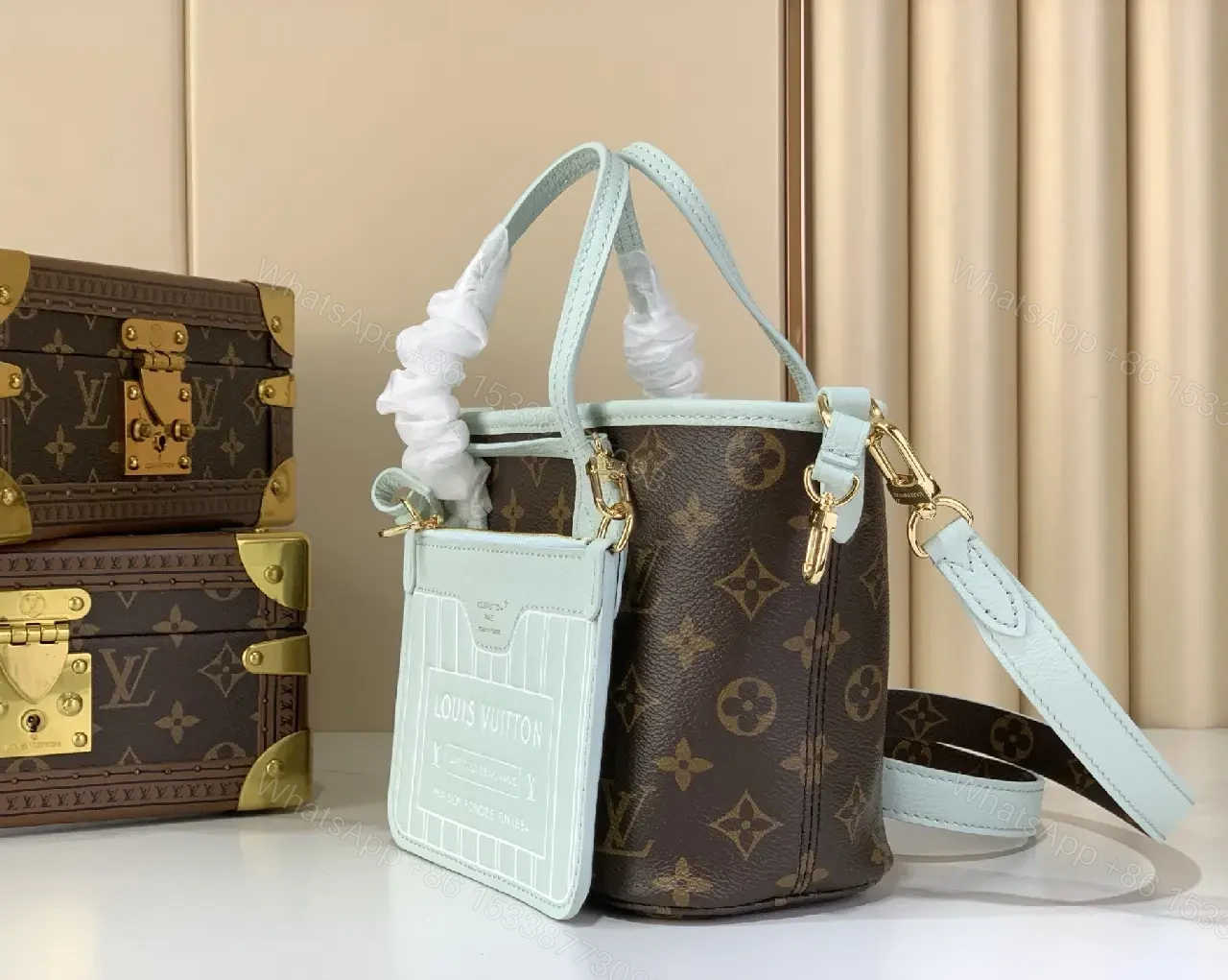 View 10 of Powder Blue Leather Trim Monogram Canvas Tote: Structured Luxury