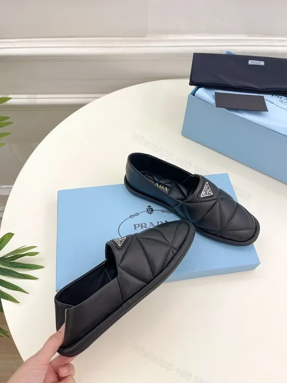View 9 of Quilted Leather Slip-Ons with Prada Triangle - All-Day Comfort