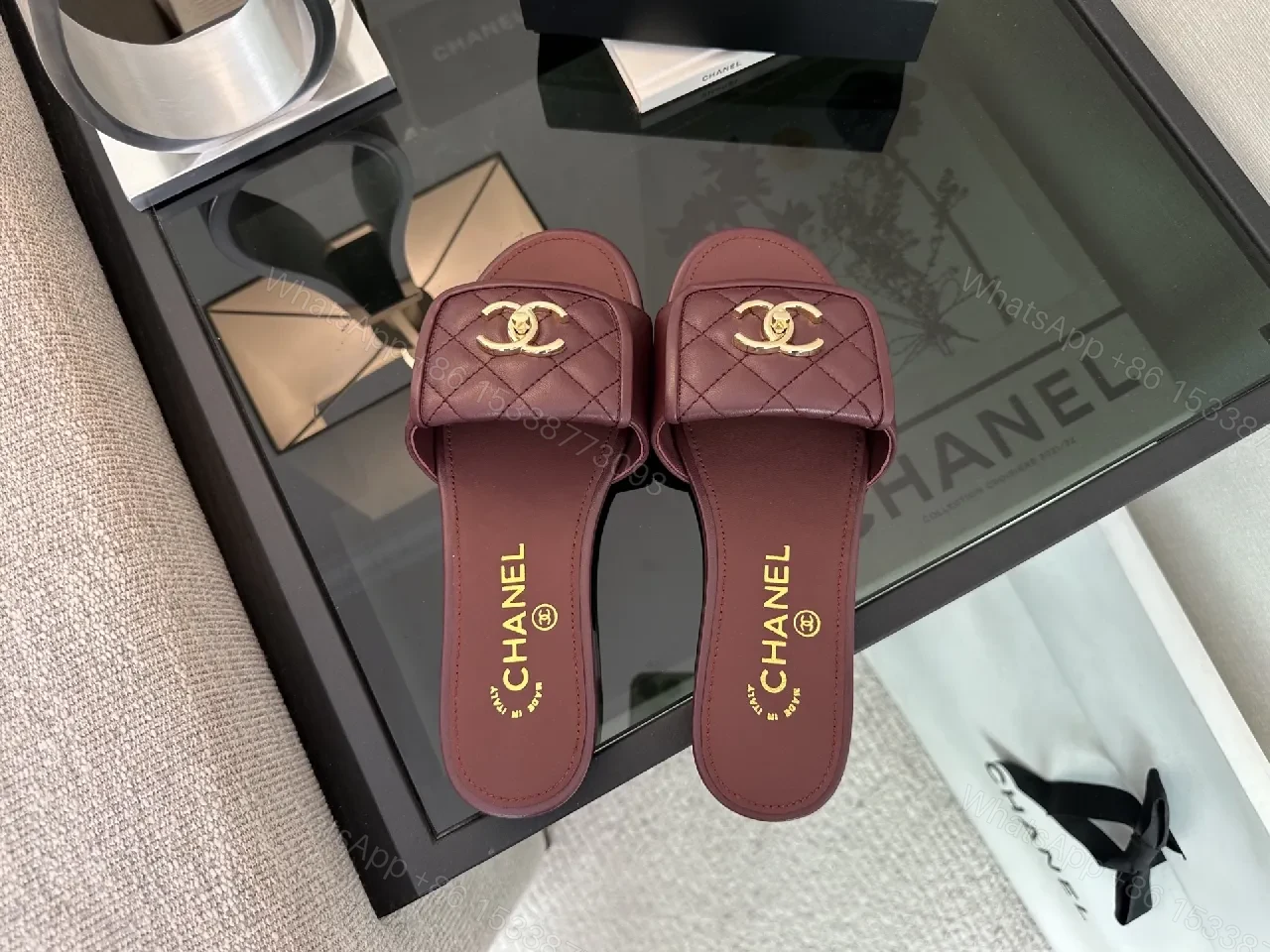 View 2 of Rich Burgundy Quilted Slip-Ons with Gold Emblem
