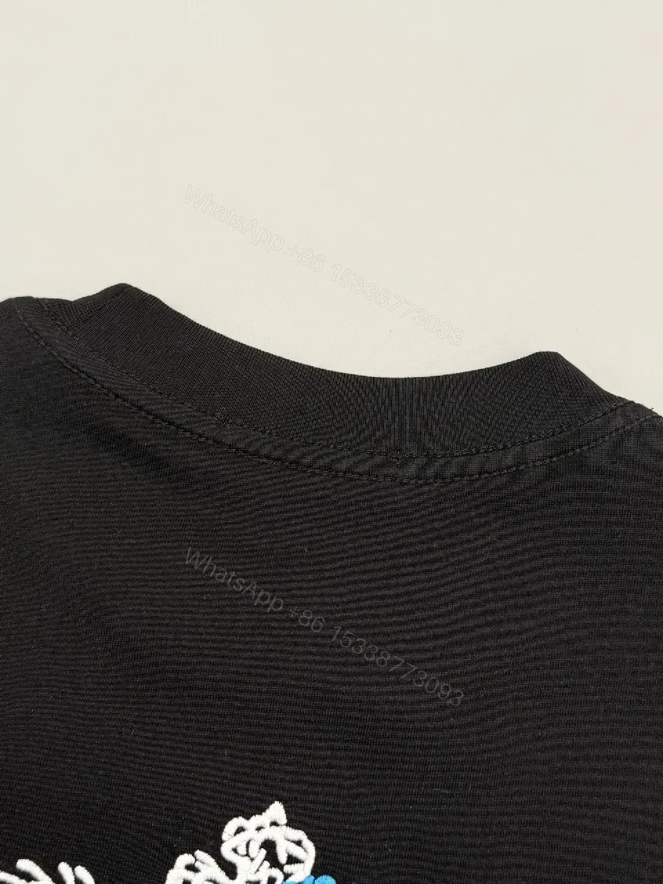 View 10 of Black Cotton Blend Tee with Prada Milano Graphic Embellishment