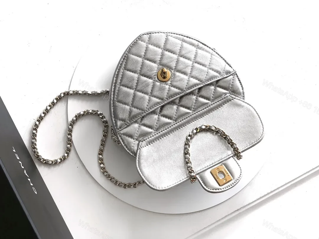View 7 of Heart-Shaped Quilted Metallic Bag with Gold Hardware