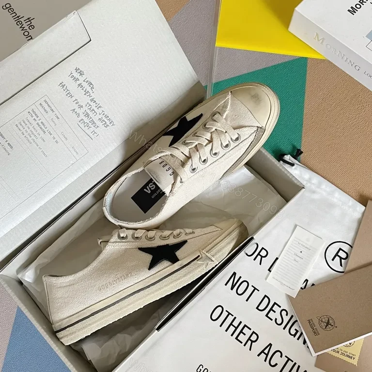 View 4 of Chic Canvas Star Sneakers - Signature Detail, Unisex