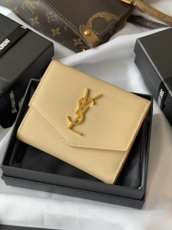 View 8 of Chic Nude Leather Wallet with Gold Hardware - Compact Luxury