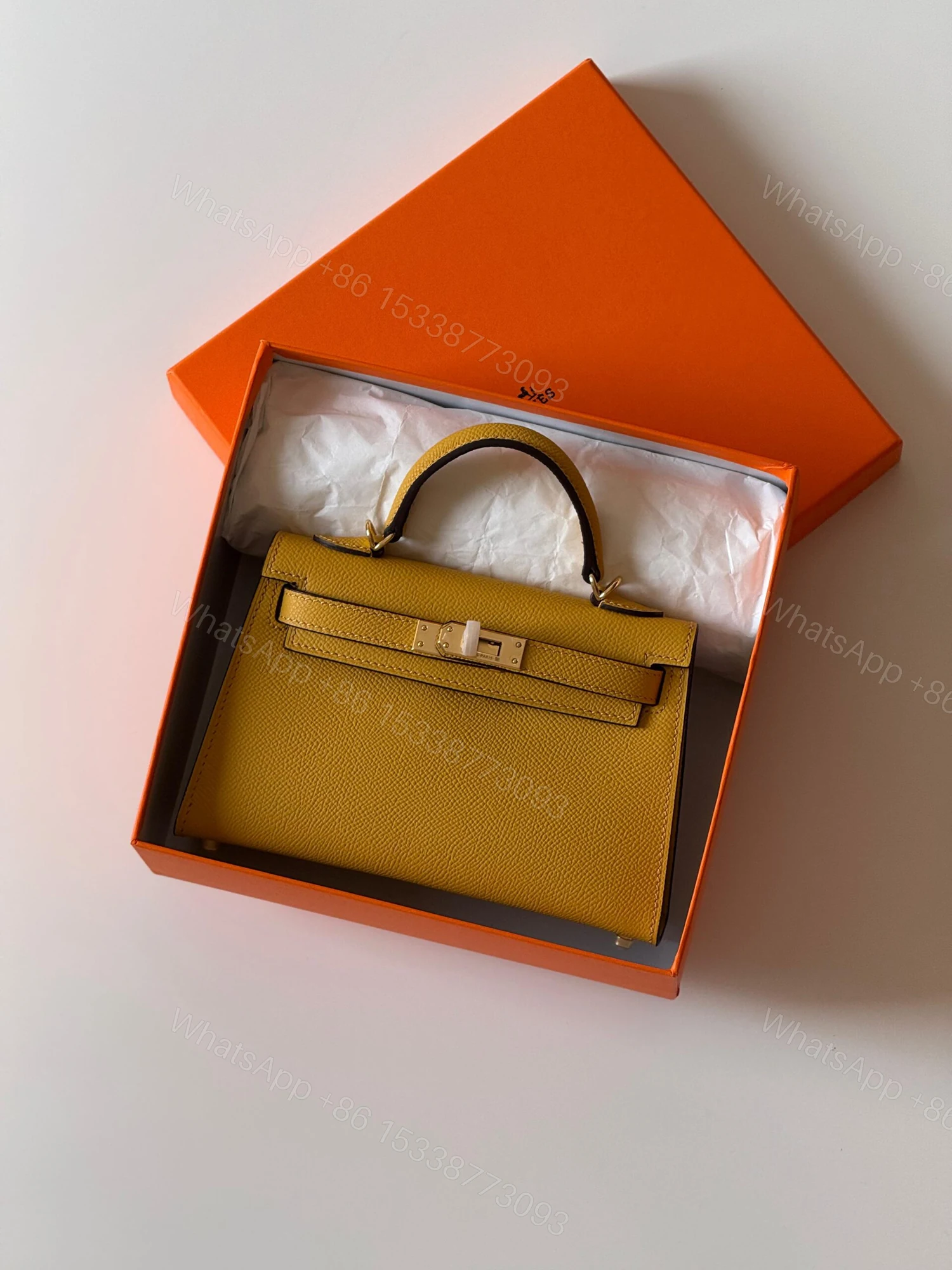 Hermès Mini Kelly 19 Sellier bag in Jaune Ambre Epsom Leather — view 1
