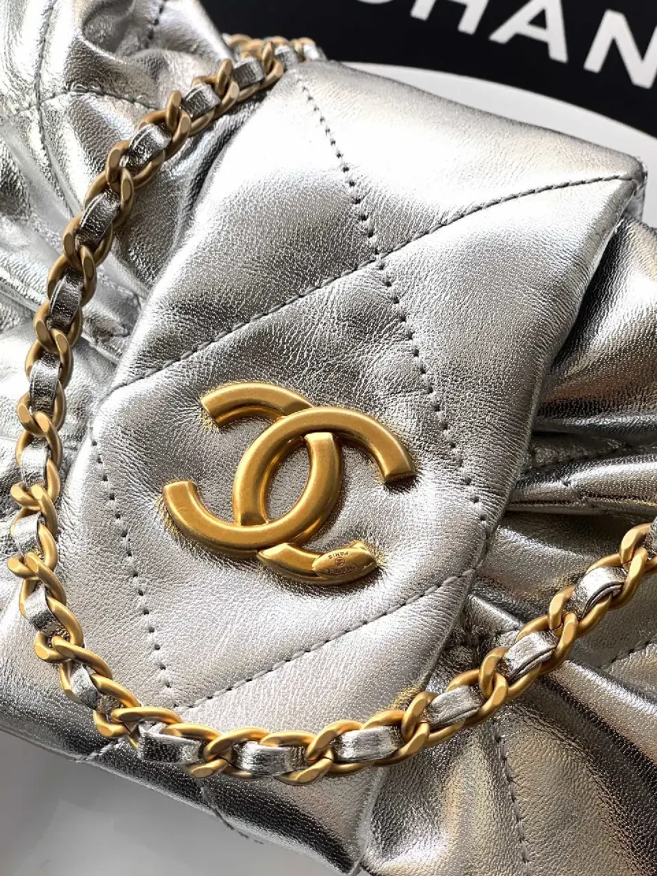 View 4 of Metallic Quilted Handbag with Gold Hardware Statement Bag