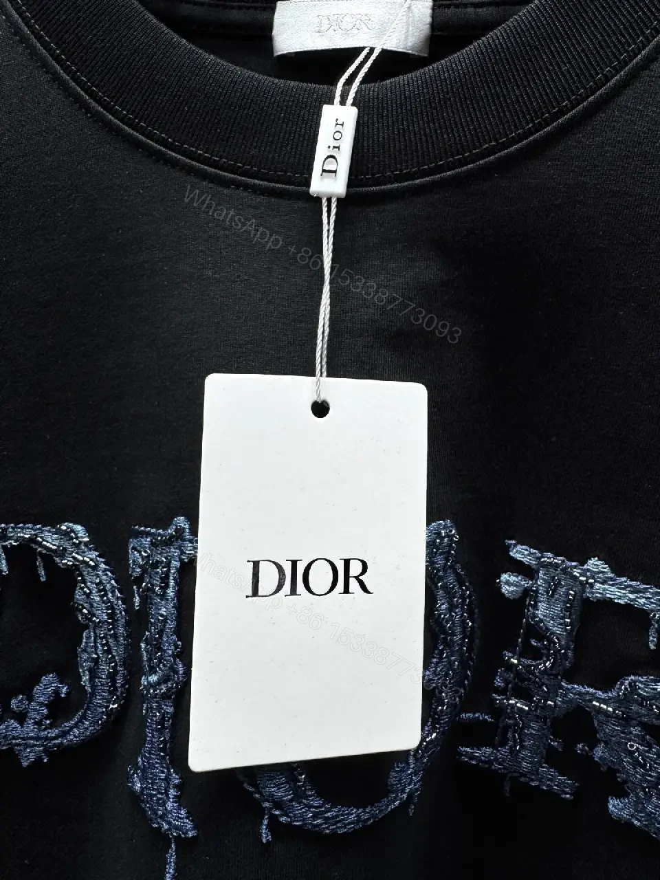 View 9 of Bold DIOR Lettering Tee - Textured Luxe Streetwear, Black, Unisex