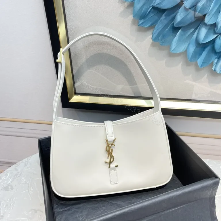 Minimalist White Leather Handbag with Gold YSL Accent — view 1