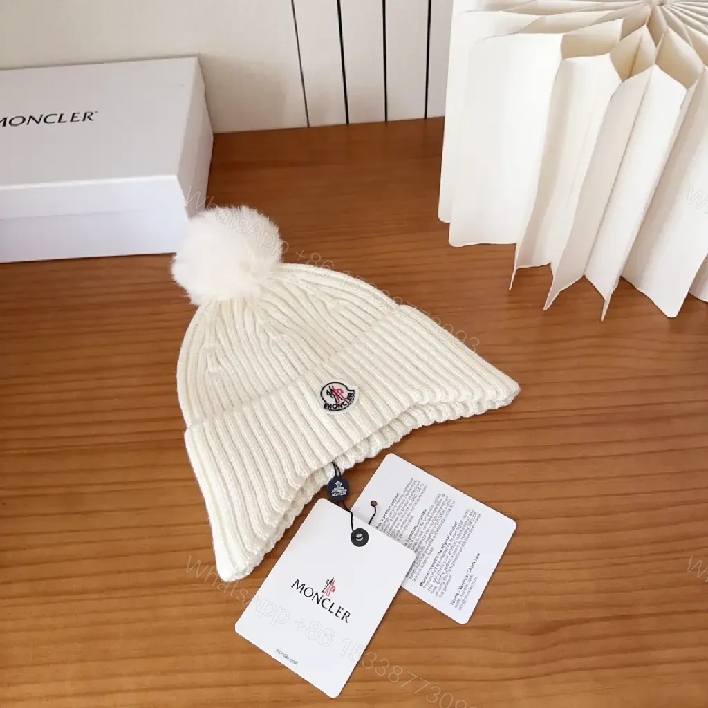 View 2 of Cozy White Knit Beanie with Pom Pom – Luxe Casual Style