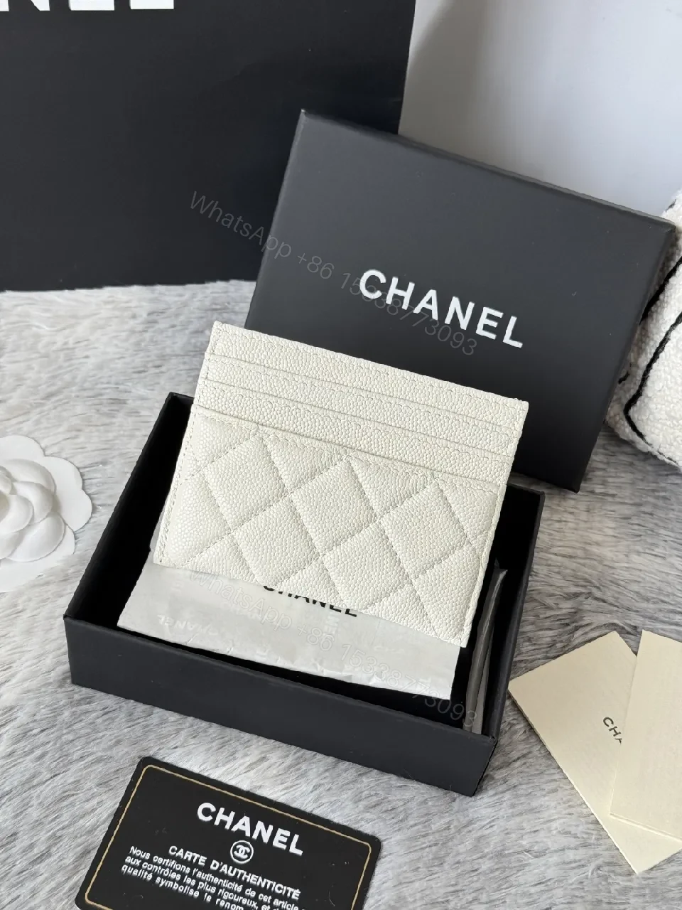 View 3 of Quilted Lambskin Wallet | Silver Logo, Compact & chic