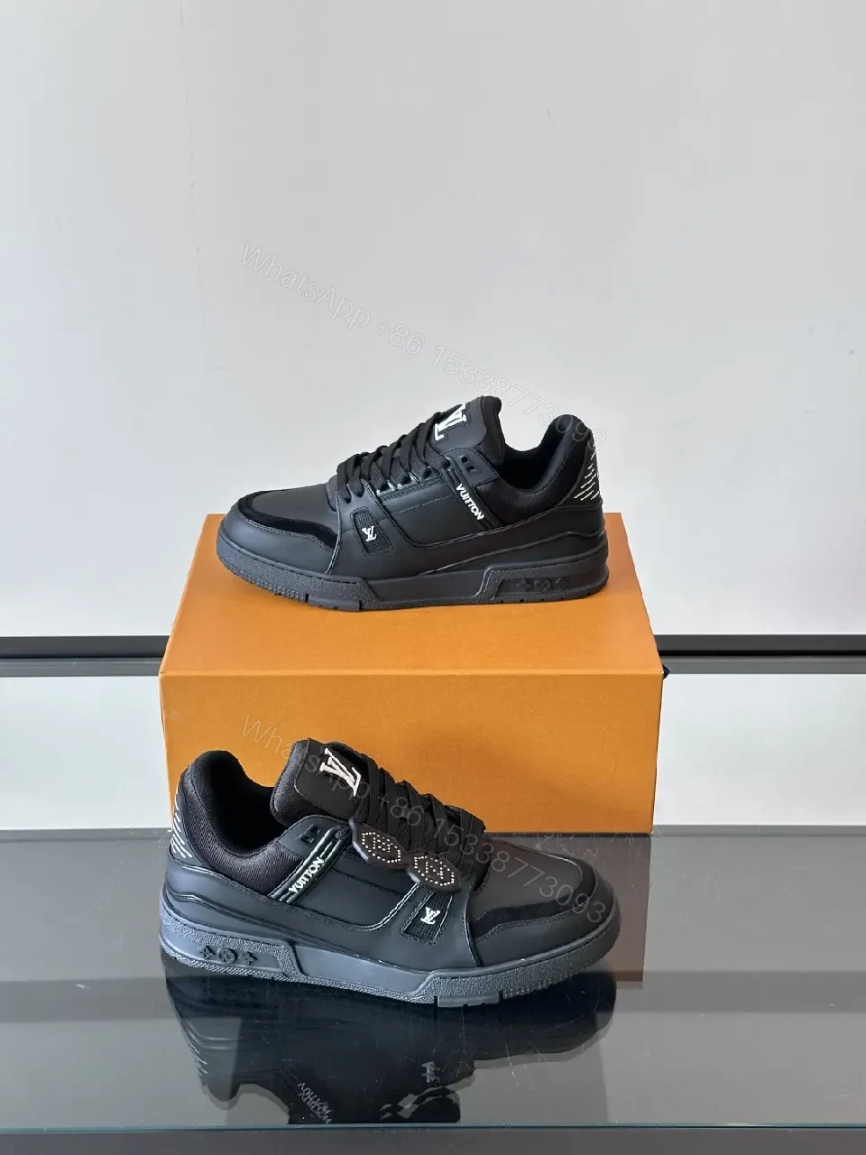 View 8 of Minimalist Black Leather Sneakers: Subtle Luxe Detailing High-Top