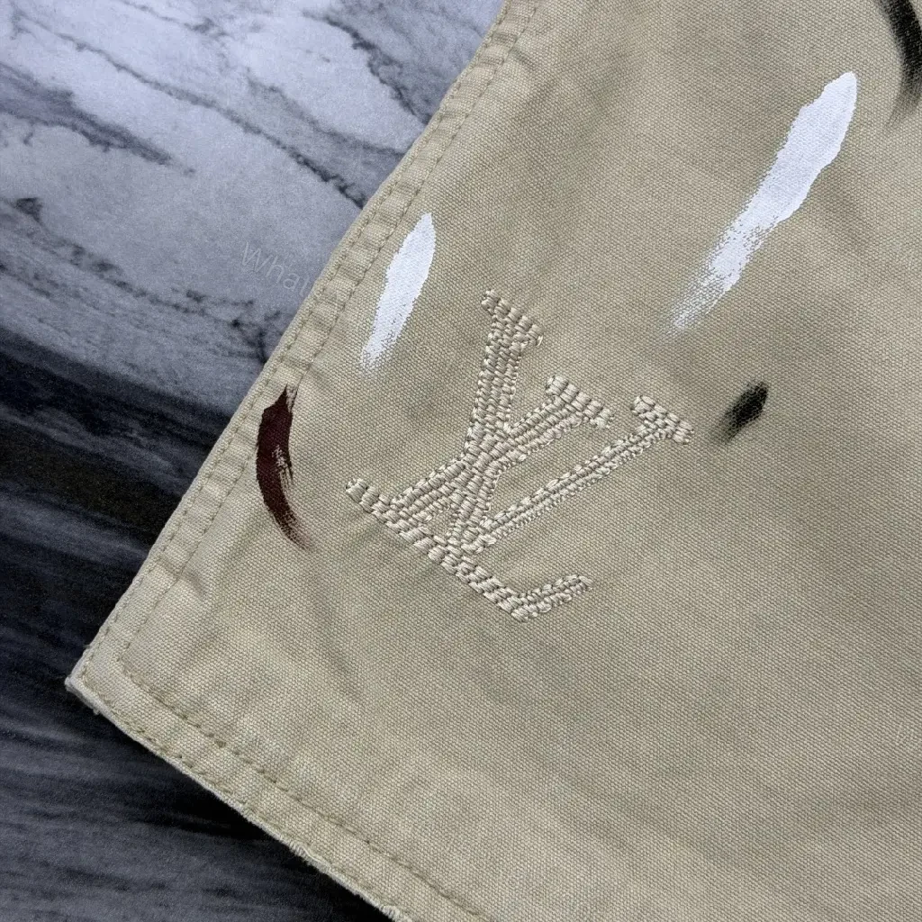 View 9 of Beige Denim-Style Shorts with LV Details, Distressed Comfort