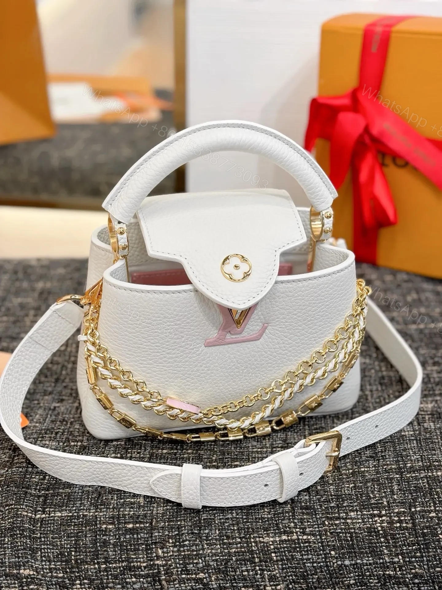 View 6 of Louis Vuitton Capucines bag in white Taurillon leather