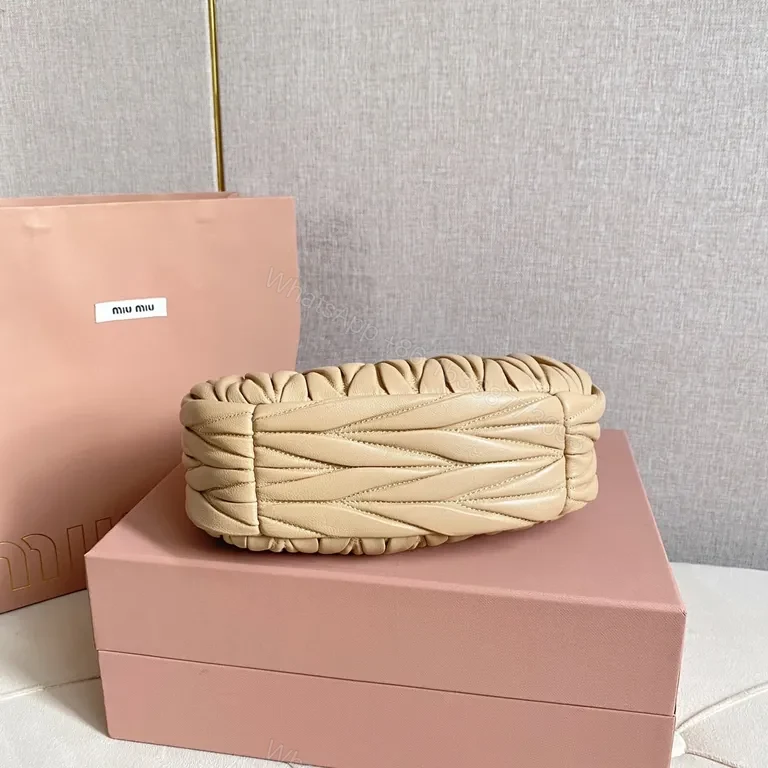 View 4 of Chic Quilted Leather Bag: Compact Luxury, Blush, Miu Miu Style