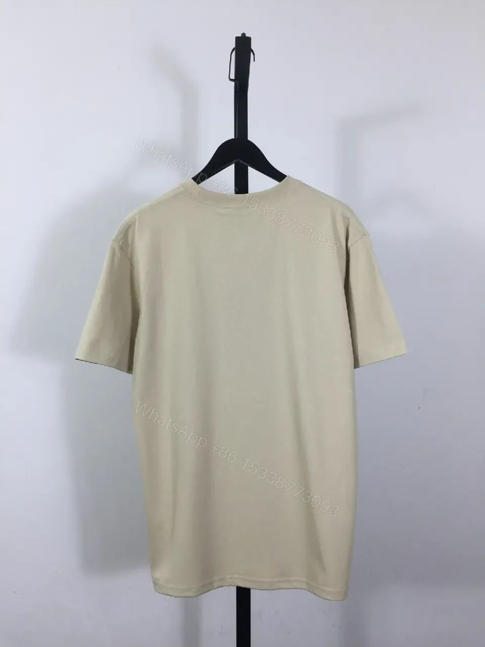 View 8 of Beige Knit Crewneck Tee: Subtle Luxury, Everyday Wear