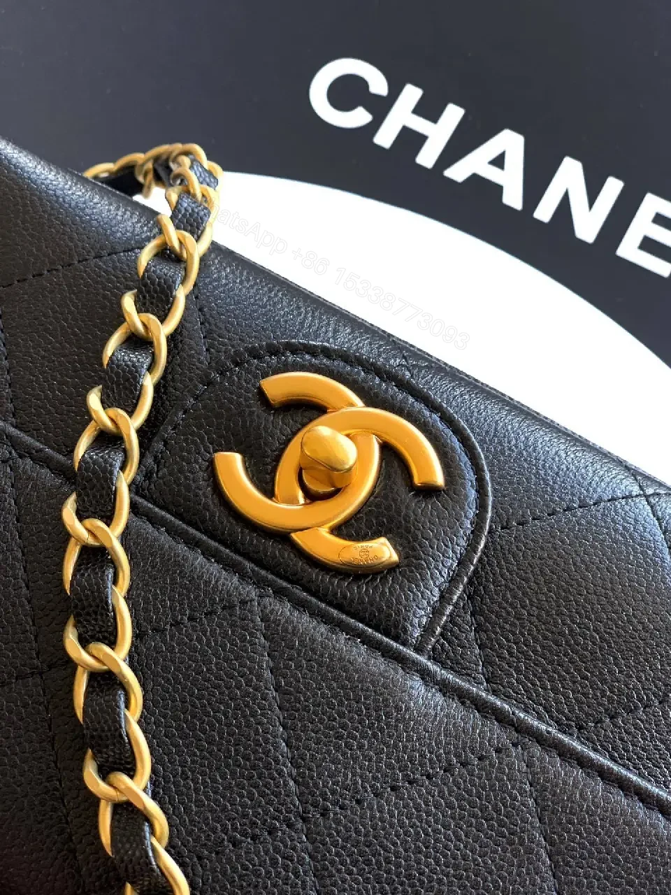 View 3 of Quilted Black Leather Bag with Gold Closure, Crossbody Glam