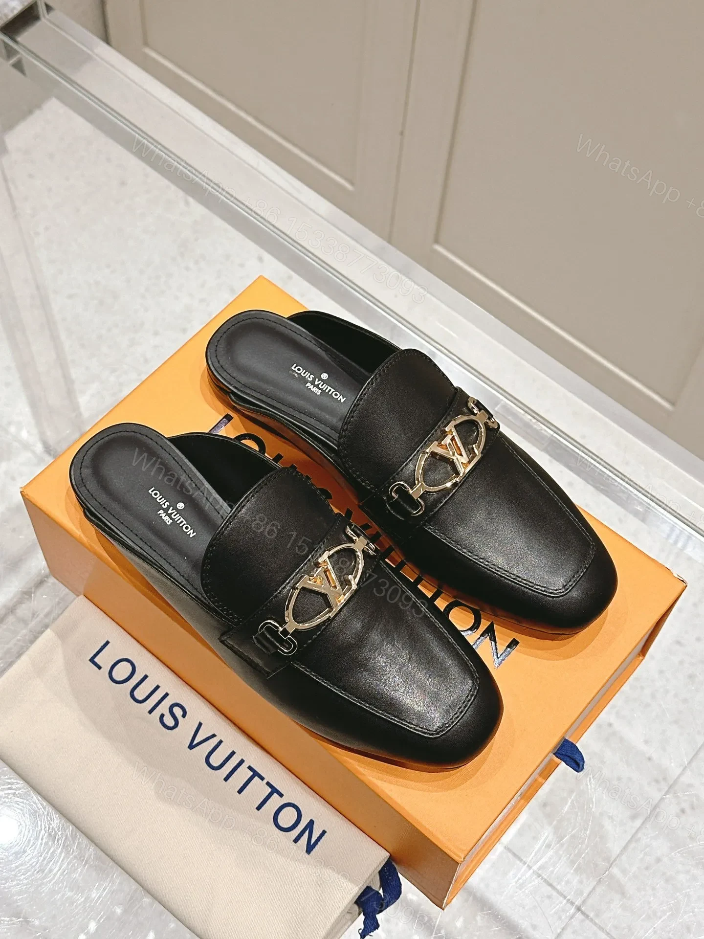 View 3 of LV Women Black Leather Slip-On Mules