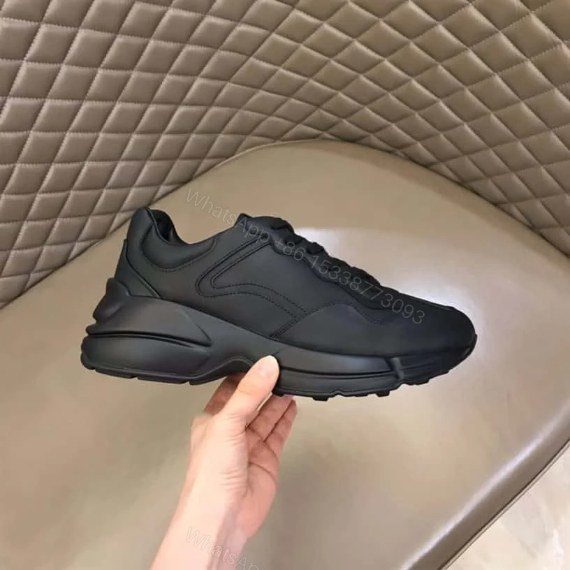 View 2 of Gucci Rhyton Low Top Sneakers In Black – GC125