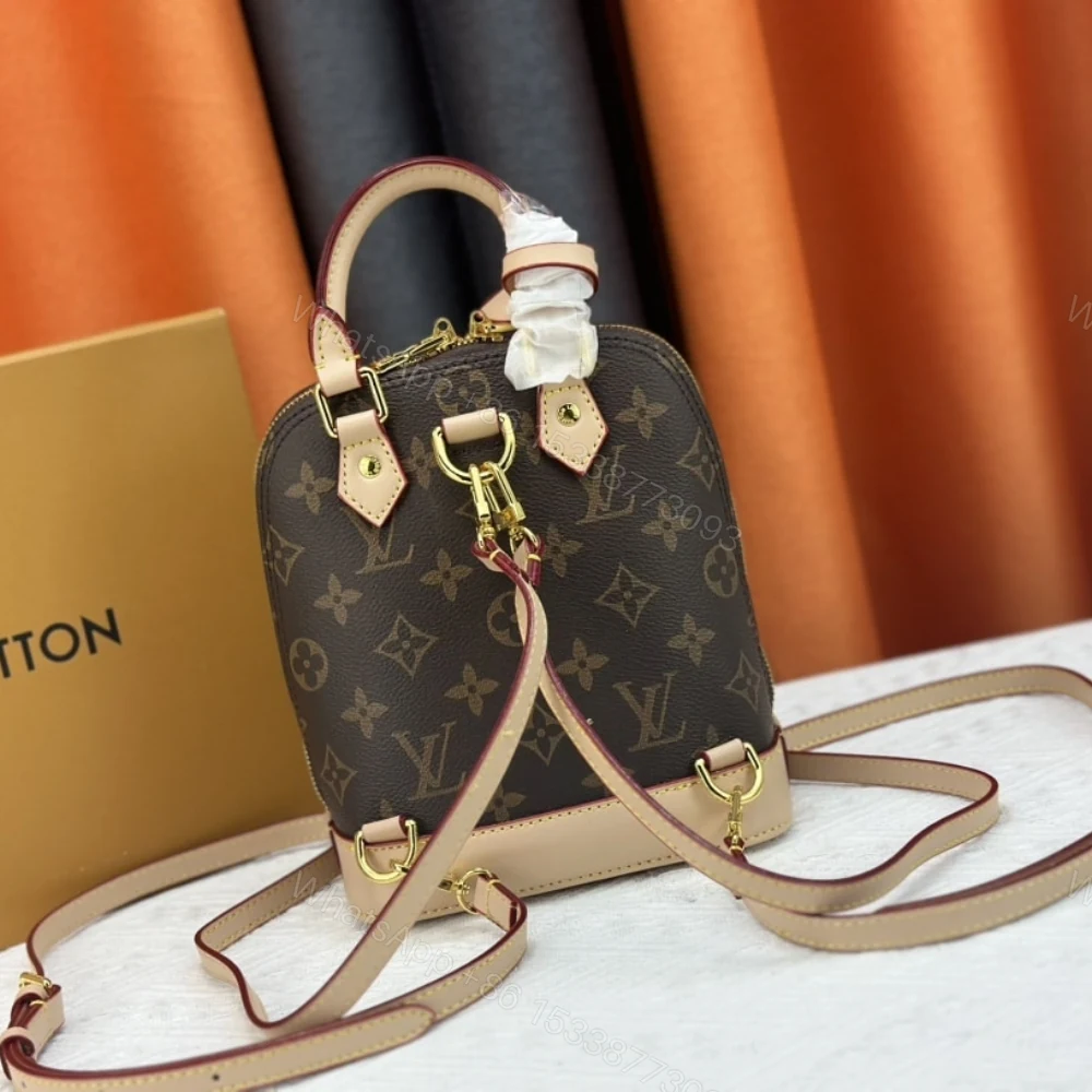 View 3 of Louis Vuitton Alma Backpack Monogram Canvas Brown 20Cm M47132
