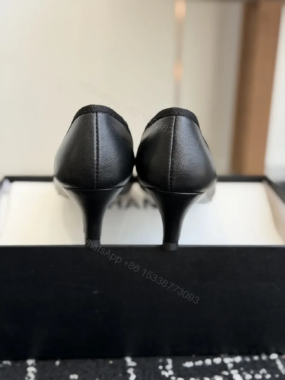 View 8 of Black Leather Pointed-Toe Pumps Chanel Logo Pumps