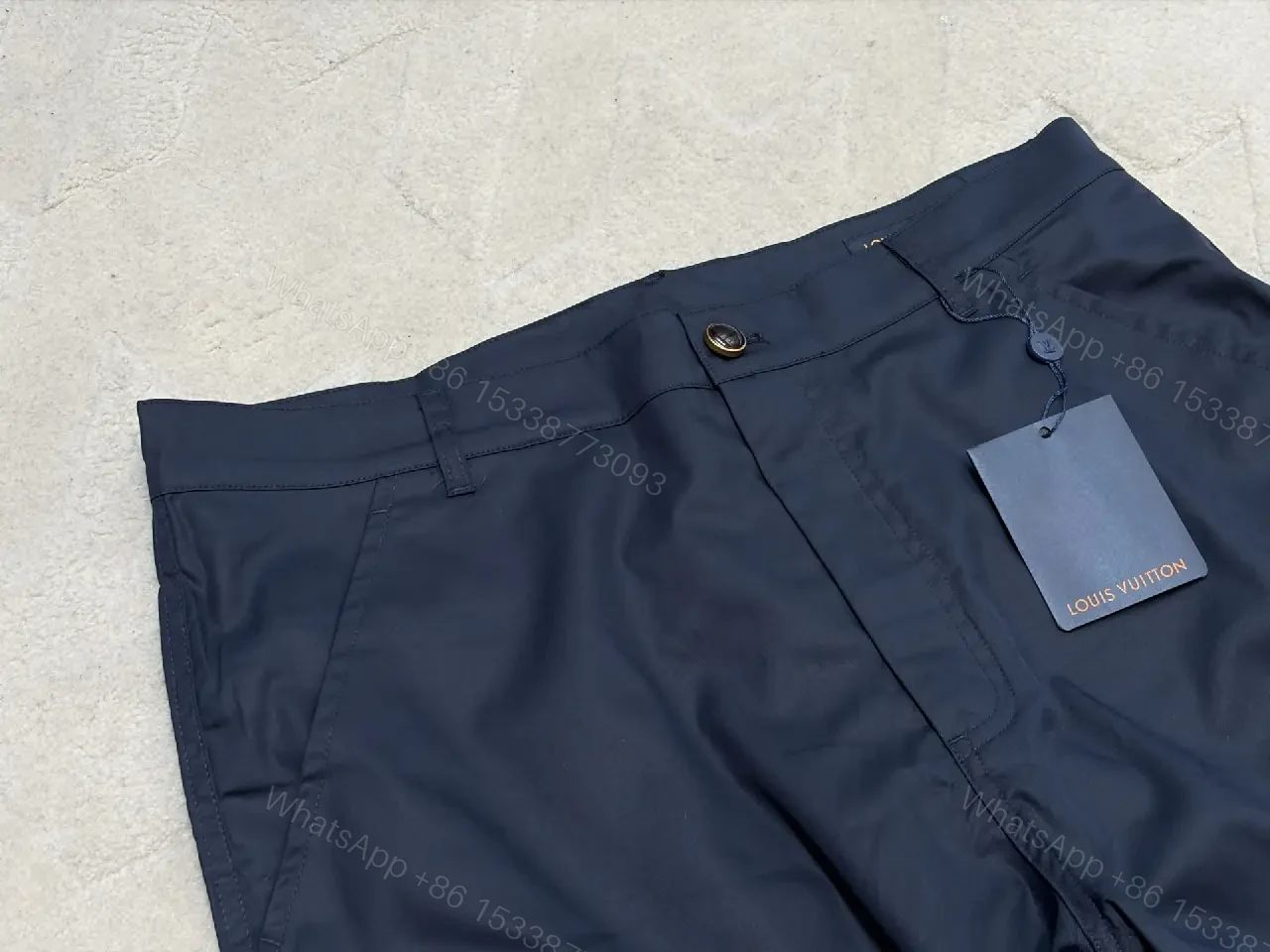 View 9 of Navy Cargo Shorts with Louis Vuitton Logo Embossed Key Features Short