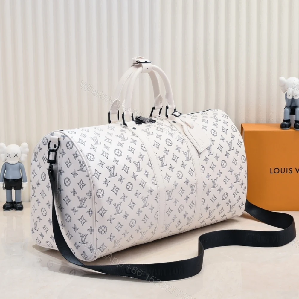 View 3 of Louis Vuitton Keepall Bandoulière 50 White 50Cm M24954